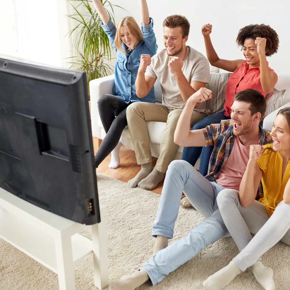 People Enjoying Television 